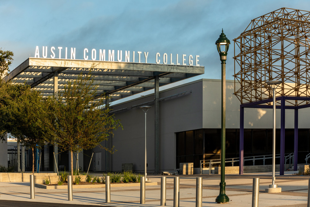 “Austin Community College” signage on the East canopy of the Paseo at the ACC Highland Campus, on Friday, August 20, 2021.